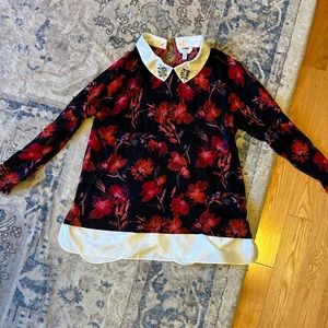 Floral sweater with attached blouse. Cool brooches on collar.
